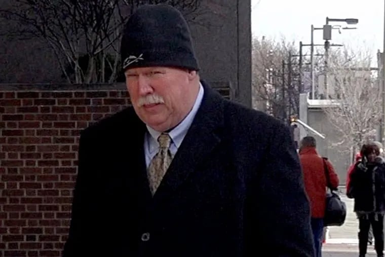 Former Lower Southampton district justice John Waltman arrives at U.S. District Court in Philadelphia on Thursday, Dec. 21, 2017, for arraignment on money laundering charges.