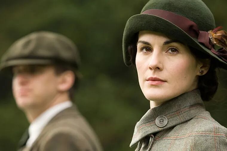 Dan Stevens as Matthew Crawley, left, and Michelle Dockery as Lady Mary are shown in a scene from "Downton Abbey." (AP Photo/PBS, Carnival Film & Television Limited 2011)