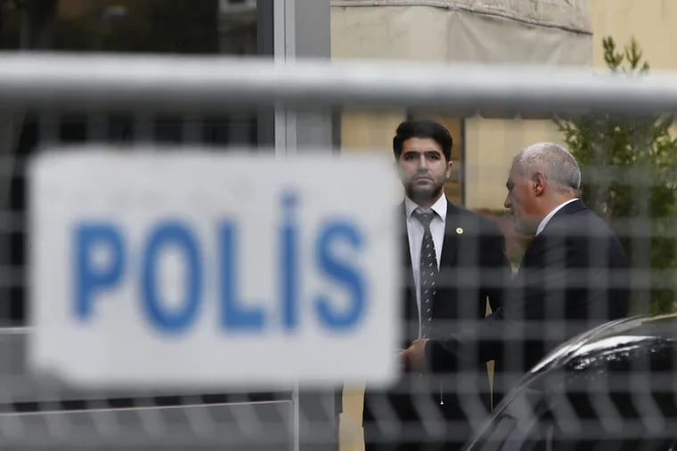 Security guards stand outside Saudi Arabia's consulate in Istanbul, Friday, Oct. 19, 2018. A Turkish official said Friday that investigators are looking into the possibility that the remains of missing Saudi journalist Jamal Khashoggi may have been taken to a forest in the outskirts of Istanbul or to another city if and after he was killed inside the consulate earlier this month.