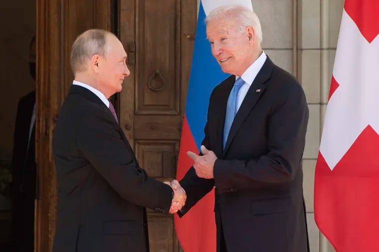 President Joe Biden and Russian President Vladimir Putin greet each other Wednesday in Geneva.