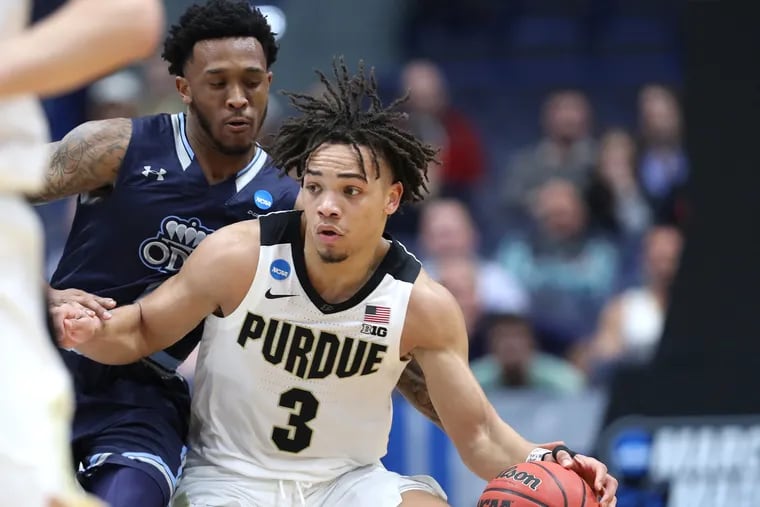 Carsen Edwards, right, of Purdue drives against Ahmad Carver of Old Dominion in a first round NCAA Tournament game at the XL Center in Hartford, CT on March 21, 2019.
