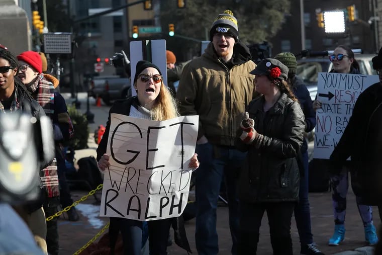Protesters in Richmond, Va., demand the resignation of Gov. Ralph Northam over racist yearbook photos.