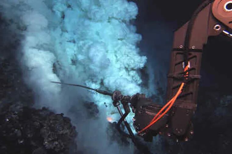 The robot that took videos of the eruption collects samples from the undersea West Mata volcano, south of Samoa. The eruption in May was the deepest ever recorded, scientists say.