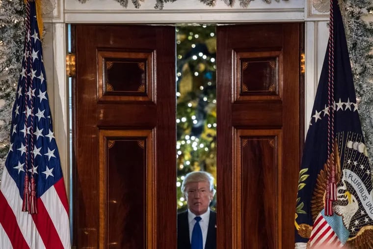 President Trump enters the Grand Foyer of the White House before making remarks on tax reform on Wednesday in Washington, D.C.