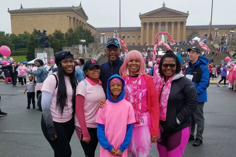 Last year, Kenya Harris (wearing a pink wig) and her family celebrated her breast cancer recovery by joining the annual Race for the Cure. Son Reece, 10, is in front, and daughter Makaylah, 20, is next to him in the pink ribbon hat.