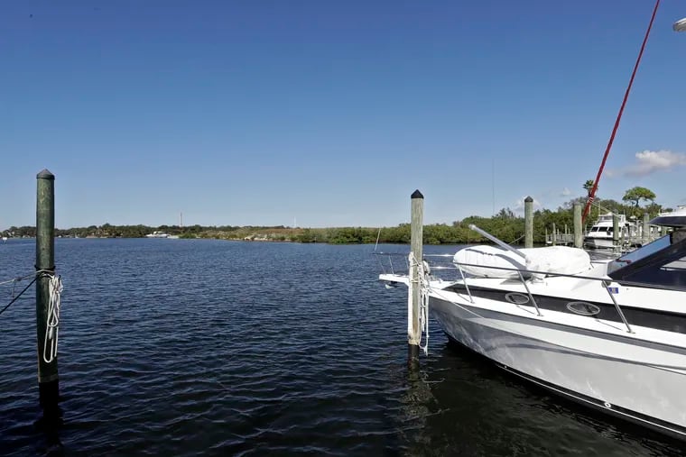 Boats moored in the Anclote River near the old Stauffer chemical plant site in Tarpon Springs, Fla.