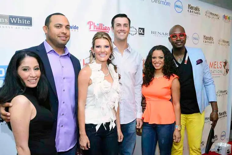 Zee Bar owner with her crew Jennifer Shamy, Howard Clark, Christie Langston and Brian Taylor with Heidi and Cole Hamels at The Hamels Foundation 4th Annual Diamonds and Denim Charity event at Vie, 600 N. Broad Street in Philadelphia on Thursday, August 15th. (HughE Dillon/Philly.com)