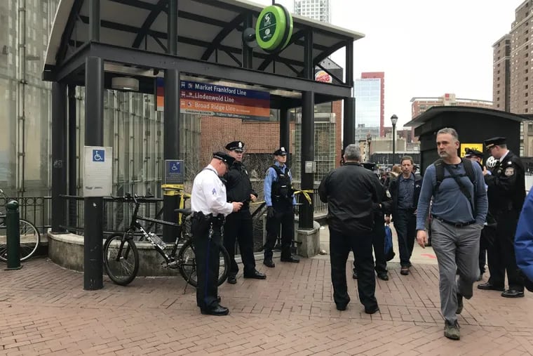 Police block off the subway entrance at the southeast corner of Eighth and Market Streets on Wednesday, April 25, 2018, after two teens were stabbed in the station.