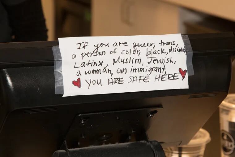 One of the signs that Melody Nielsen put up at the register at Saxbys Coffee at 30th Street Station, telling those who have been targeted by Trump's rhetoric that they are welcome on Sunday, Nov. 21.