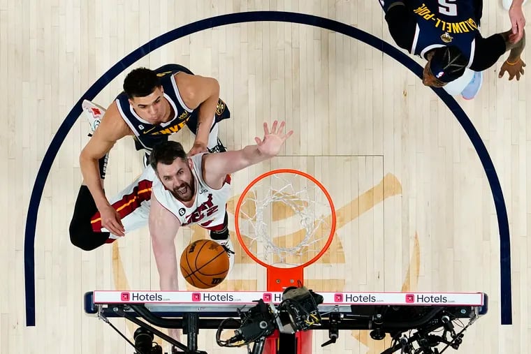 DENVER, COLORADO - JUNE 04: Kevin Love #42 of the Miami Heat battles Michael Porter Jr. #1 of the Denver Nuggets for a rebound during the second half in Game Two of the 2023 NBA Finals at Ball Arena on June 04, 2023 in Denver, Colorado. NOTE TO USER: User expressly acknowledges and agrees that, by downloading and or using this photograph, User is consenting to the terms and conditions of the Getty Images License Agreement. (Photo by Kyle Terada - Pool/Getty Images)