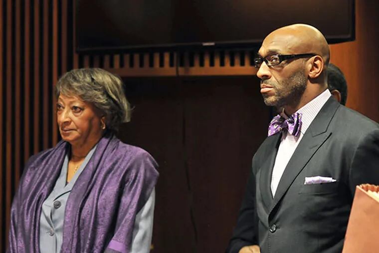 Former NFL football star, Irving Fryar, right, and his mother, Allene McGhee, appear before Judge James W. Palmer in Burlington County Superior Court in Mount Holly, N.J., Tuesday, Jan. 21, 2014, as they pleaded not guilty to charges that they conspired to steal more than $690,000 through a mortgage scam. State prosecutors allege Fryar's 72-year-old mother submitted false information to obtain five loans on her home in Willingboro over a six-day period. (AP Photo/Burlington County Times, Dennis McDonald, Pool)