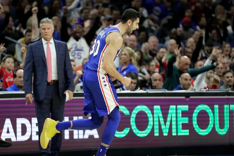 Furkan Korkmaz celebrates after hitting a three-pointer in the first half.