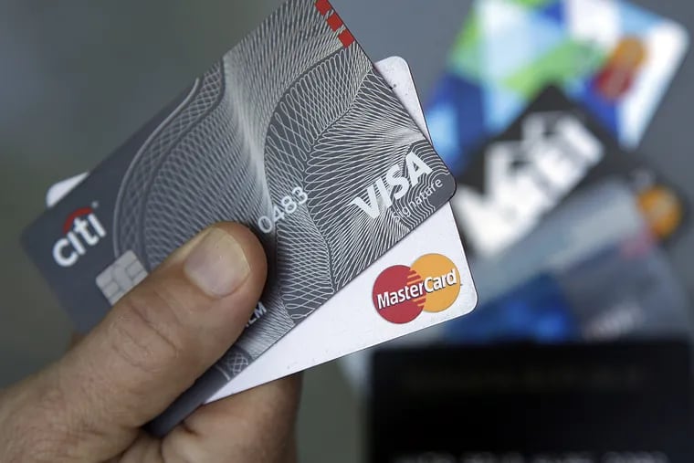 Visa and Mastercard say they and several banks will pay $6.2 billion to settle part of a long-running lawsuit brought by merchants over fees on credit card transactions.