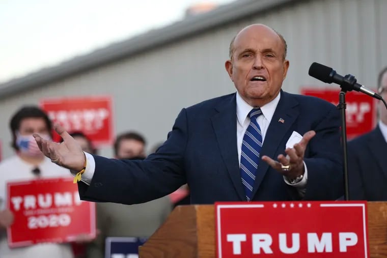 Rudy Giuliani speaks at a news conference about President Donald Trump’s legal challenges to the election in Pennsylvania at Atlantic Aviation in Philadelphia on Wednesday, Nov. 4, 2020.