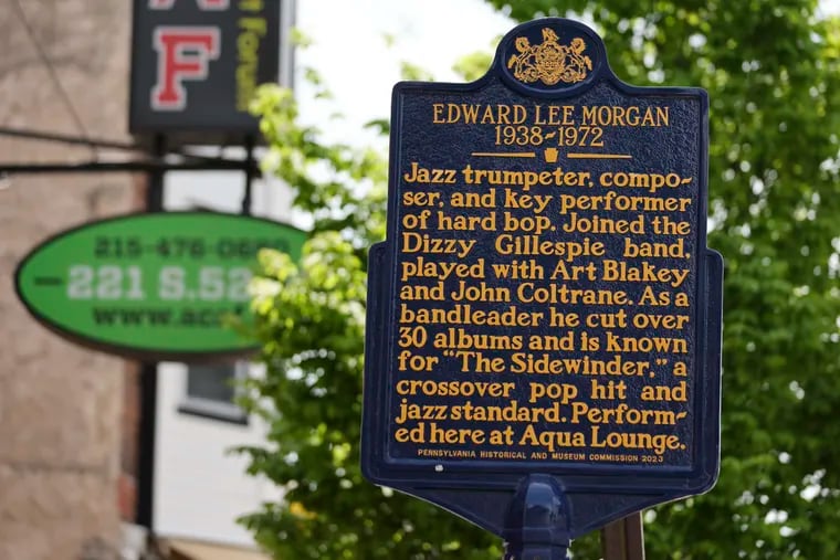 The historical marker honoring of jazz trumpeter Edward Lee Morgan is at the corner of 52nd and Chancellor Streets, outside of the now-defunct Aqua Lounge jazz club, in Philadelphia.