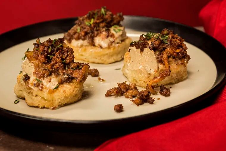 Brown butter biscuits topped with &quot;bird funk&quot; and chicken liver butter by chef Marcus Samuelsson.