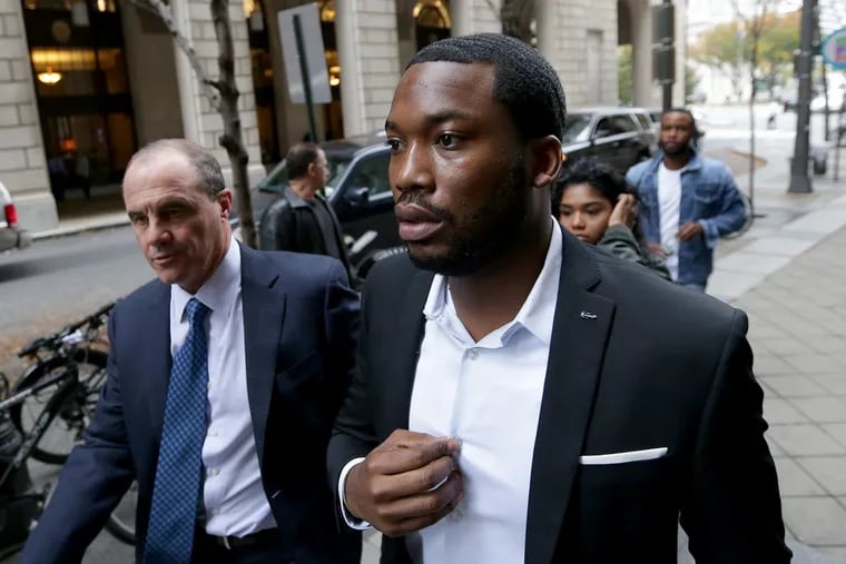Rapper Meek Mill, right, arrives at the Criminal Justice Center with his lawyer, Brian McMonagle, on Nov. 6, 2017.
