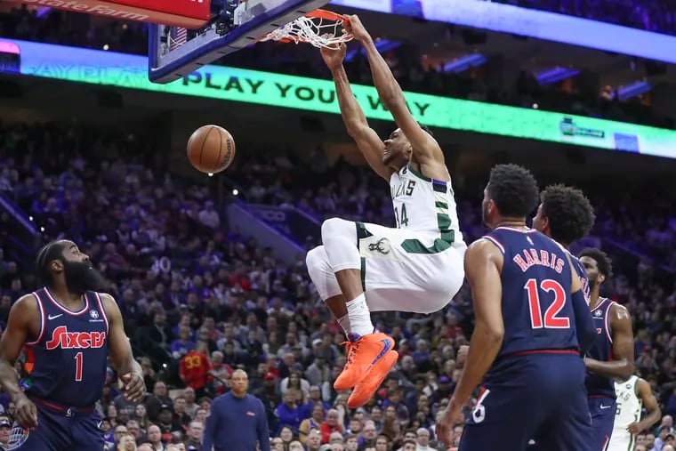Milwaukee Bucks forward Giannis Antetokounmpo (34) dunks the ball in the first half of a game against the Sixers at the Wells Fargo Center in Philadelphia on Tuesday.