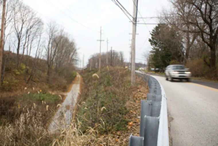 The former rail line , which will be turned into a trail beginning in 2009, is visible along Swedesford Road in East Whiteland Township. It roughly parallels Route 202 in Chester and Montgomery Counties, and planners envision cyclists commuting on it.