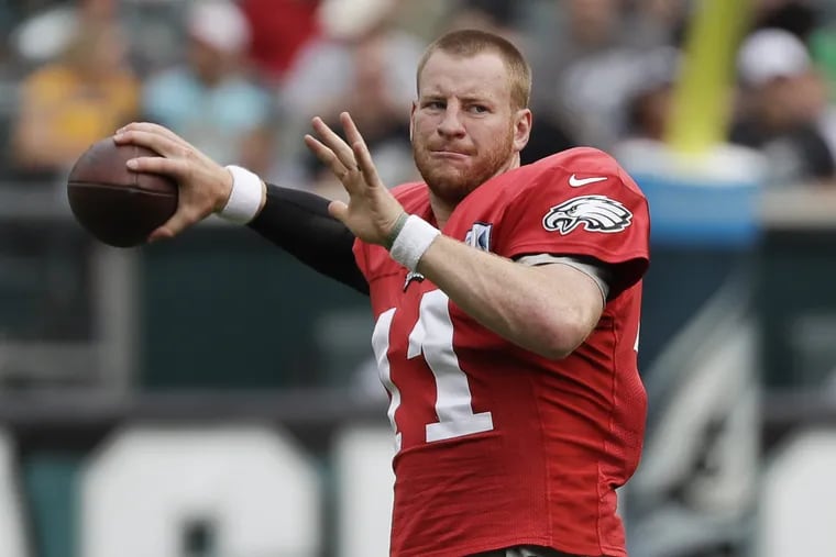 Eagles quarterback Carson Wentz throws the football during open practice at Lincoln Financial Field in South Philadelphia on Saturday, August 11, 2018. YONG KIM / Staff Photographer