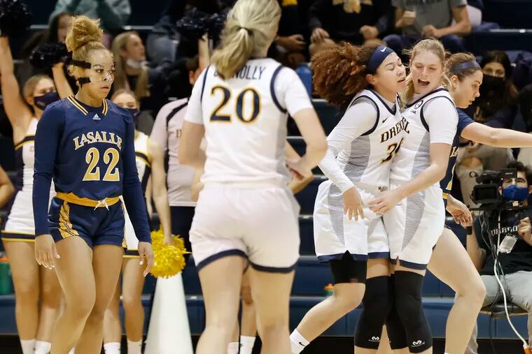 Tessa Brugler (right, celebrating with Mariah Leonard) is averaging 16 points and 9.3 rebounds for 2-1 Drexel.