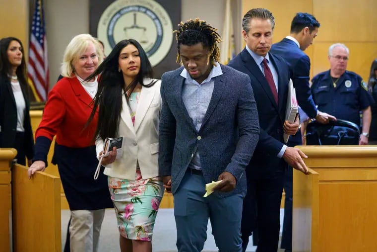 Phillies player Odubel Herrera leaves the courtroom with his girlfriend, Melany Martinez-Angulo, after his hearing on a domestic violence case in Atlantic City on Wednesday, July 3, 2019. Domestic assault charges against Herrera were dismissed after Martinez-Angulo declined to press charges.