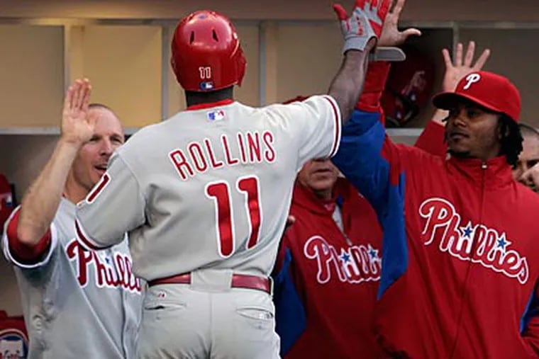 Jimmy Rollins scored two runs against the Padres on Saturday night. (Lenny Ignelzi/AP Photo)
