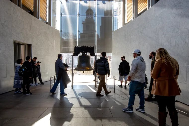Guests visit the Liberty Bell on Market Street near 6th Street, Jan. 26, 2019. The Independence Mall National Historical Park re-opened after President Donald Trump signed a bill to have employees paid after a 35-day partial government shutdown.
