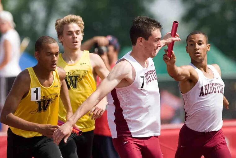 Abington and Central Bucks West have turned in some of the best times in the nation this year in the 4x800 relay and are headed for a collision at the state championships. In the qualifying race Friday at Shippensburg University, above, (from left) Central Bucks West's Matt Bee gets the baton from Connor Manley just behind Abington's Kyle Moran and Macey Watson. The Central Bucks West team was edged by Abington at the Penn Relays, but trumped the Ghosts at the indoor state meet this past winter.