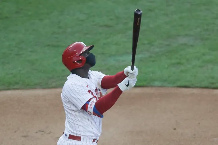 Phillies shortstop Didi Gregorius watched his grand slam against the Braves on Aug. 10. Will he be hitting for another team next season?