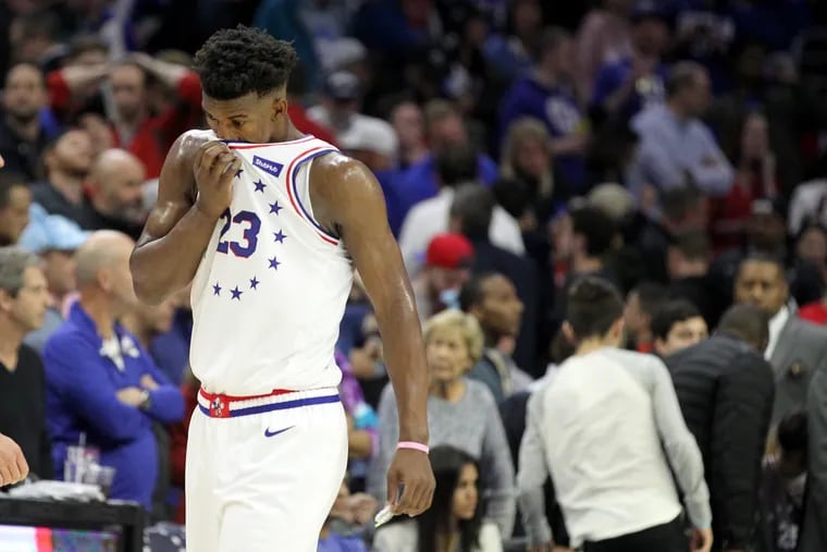 The Sixers Jimmy Butler  walkS off the court during a timeout in the final minute. The Raptors evened their NBA Eastern Conference Semifinal Playoff Series 2-2 at the Wells Fargo Center on May 5, 2019.
