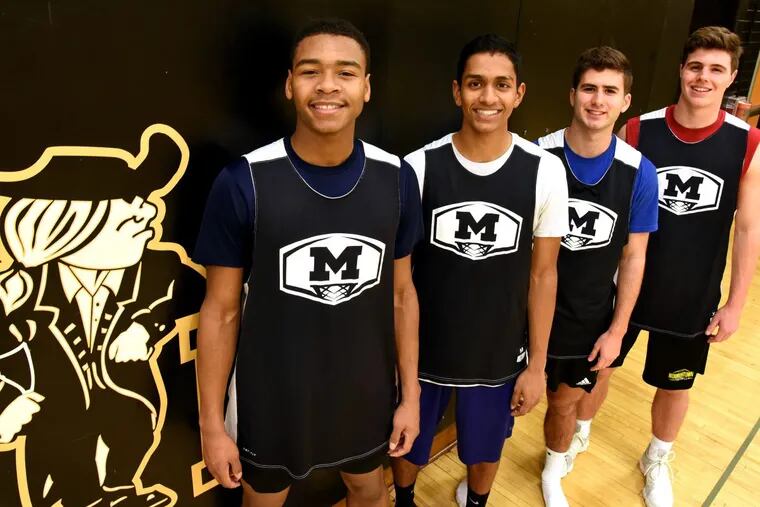 Moorestown’s basketball team (from left to right): Nick Cartwright-Atkins, Akhil Giri, Vinnie Caprarola and Brian McMonagle.