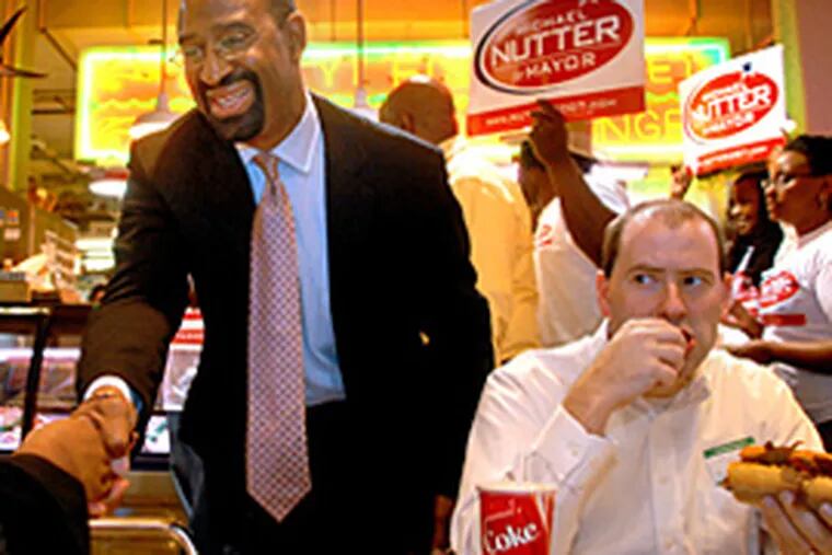 Philadelphia Mayor Michael Nutter saw the value of a campaign visit to Reading Terminal Market, during a stop last May. It's a definite "do." (Tom Gralish/Inquirer file)
