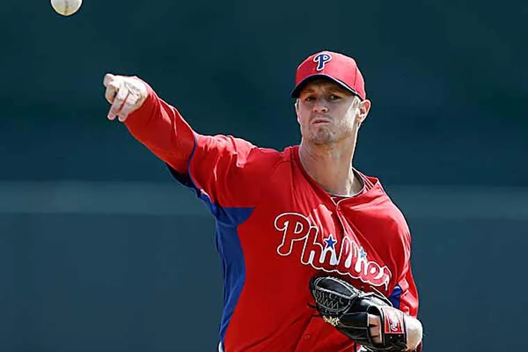 For the first time since 2008, the only thing that can keep Kyle Kendrick out of the Phillies' Opening Day rotation is an injury. (Charlie Neibergall/AP)