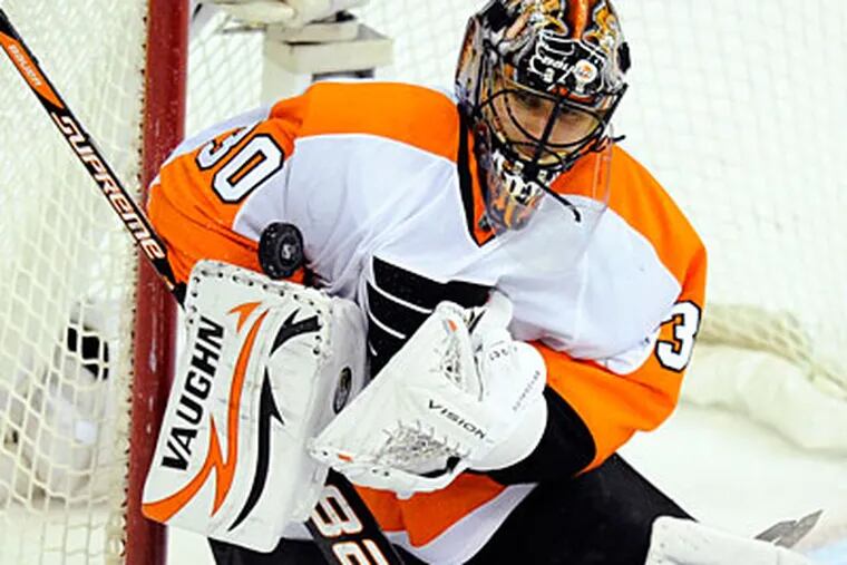 Flyers goalie Ilya Bryzgalov stopped 31 of 32 shots. (Nick Wass/AP Photo)