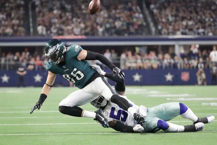 Eagles tight end Zach Ertz gets the pass deflected away by Dallas Cowboys middle linebacker Jaylon Smith during the third-quarter of Sunday's game. Ertz had two catches, none in the first three quarters.