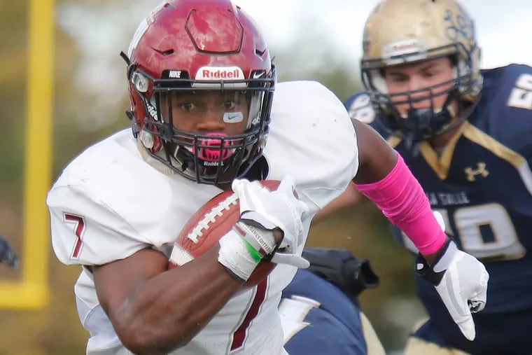 St. Joseph's Prep running back D'Andre Swift heads to the end zone in the fourth quarter for the Hawks' sixth touchdown against La Salle in a 2016 game. St. Joe’s Prep went on to win, 49-24, in a Catholic League AAAA football game at Plymouth Whitemarsh.
