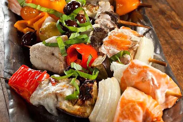 Mediterranean fish kabobs with salmon, bluefish, onions, peppers, eggplant, olives, and basil are among dishes made with fresh, unprocessed ingredients that can make Passover eating healthy, satisfying, and easy.