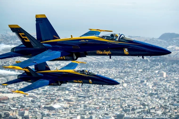 In advance of Fleet Week performances, U.S. Navy Blue Angels fly over San Francisco on Thursday, Oct. 10, 2019. (AP Photo/Noah Berger)