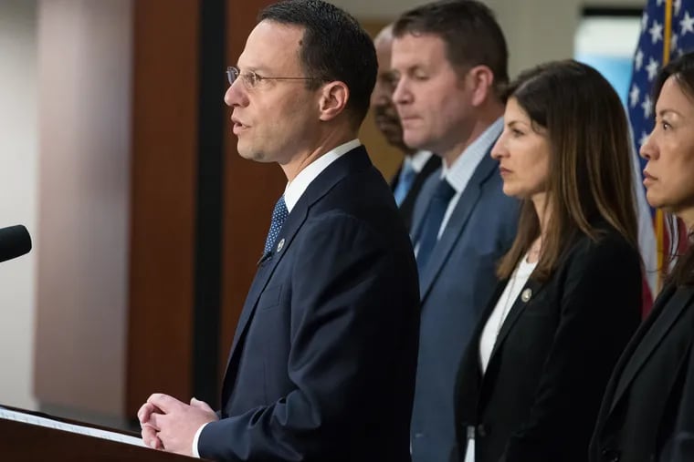 The office of Pennsylvania Attorney General Josh Shapiro, pictured above at the podium, conducted a nearly two-year investigation into allegations of clergy sexual abuse at nearly every Catholic diocese in the state. JESSICA GRIFFIN / Staff Photographer