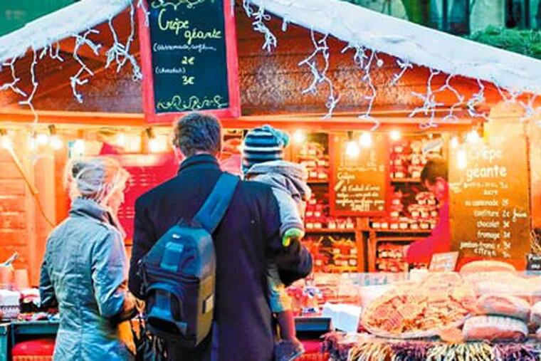Brussels' Christmas market is a late-comer, established in 2002 but no less lavish than others, filling its medieval Grand Place with artisan chalets, an ice rink, Ferris wheel, and nightly sound-and-light shows. (Joseph Jeanmart/OPT)