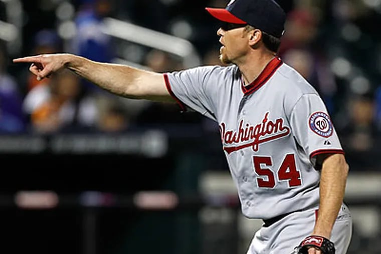 "When [Chase] Utley and [Ryan] Howard get back, it's still their division to lose," Brad Lidge said of the Phillies. (Kathy Willens/AP)