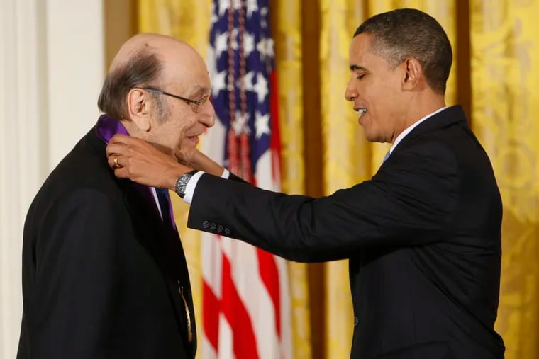 President Barack Obama presents a 2009 National Medal of Arts to Milton Glaser, in the East Room of the White House in Washington. Glaser, the designer who created the “I (HEART) NY” logo and the famous Bob Dylan poster with psychedelic hair, died Friday, June 26, 2020, his 91st birthday.