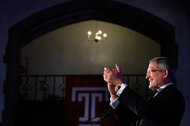 Temple University President Neil D. Theobald applauds during the annual Lew Klein Alumni in the Media Awards ceremony in Mitten Hall in Philadelphia on October 17, 2013. ( DAVID MAIALETTI / Staff Photographer )