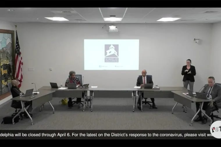 A screenshot from the livestream of the Philadelphia school board meeting; the board held a mostly virtual meeting, observing coronavirus social distancing guidelines, on March 26. L-R: Board member Julia Danzy, Board President Joyce Wilkerson, Superintendent William R Hite Jr, Board member Chris McGinley. In the background is a sign language interpreter.