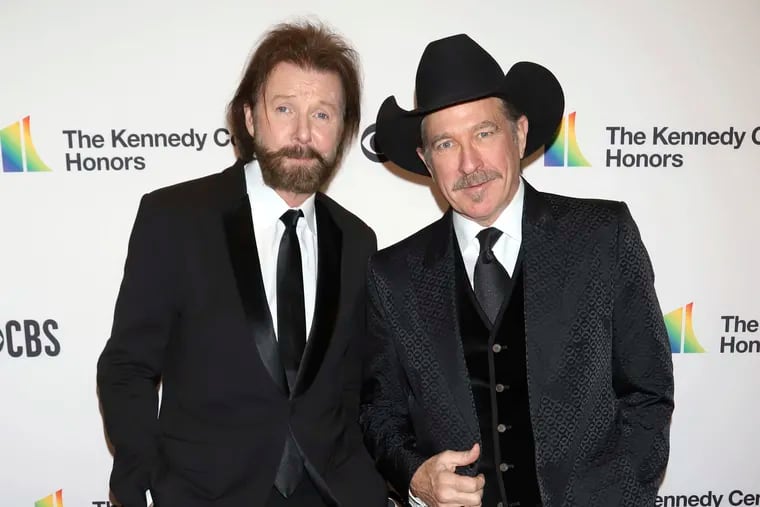 Ronnie Dunn, left, and Kix Brooks attend the 41st Annual Kennedy Center Honors in Washington in 2018.