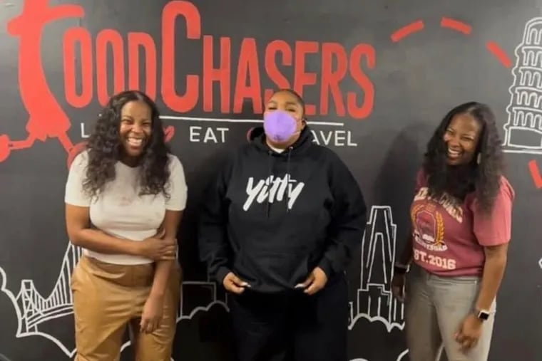 Lizzo ate at FoodChasers' Kitchen in Elkins Park, owned by sisters Kala (left) and Maya Johnstone, on Sept. 28, 2022, the night before her concert at the Wells Fargo Center.