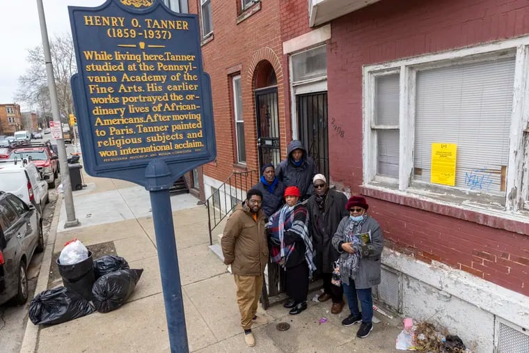 From left to right front row are Christopher Rogers, Judith Robinson, Hasan Roland, and Jacquline Wiggins. On stairs in background from left are Kevin Upshur and Salim Ali. Friends of the Henry Ossawa Tanner house gathered outside the row house located at l2908 W. Diamond Street in Philadelphia on Thursday morning, February 24, 2022. “Henry Ossawa Tanner was an American artist and the first African-American painter to gain international acclaim.”