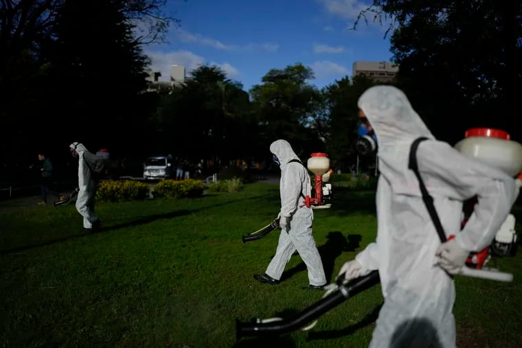 A brigade fumigates to combat dengue amid a surge in cases nationwide in Buenos Aires, Argentina.