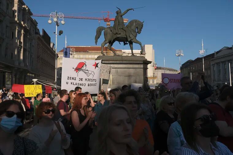 People attend a protest in solidarity with a woman who was denied an abortion despite her fetus having serious health problems, in Zagreb, Croatia, in 2022. In staunchly Catholic Croatia, influential conservative and religious groups have tried to get abortion banned but with no success. However, many doctors refuse to terminate pregnancies, forcing Croatian women to travel to neighboring countries for the procedure.